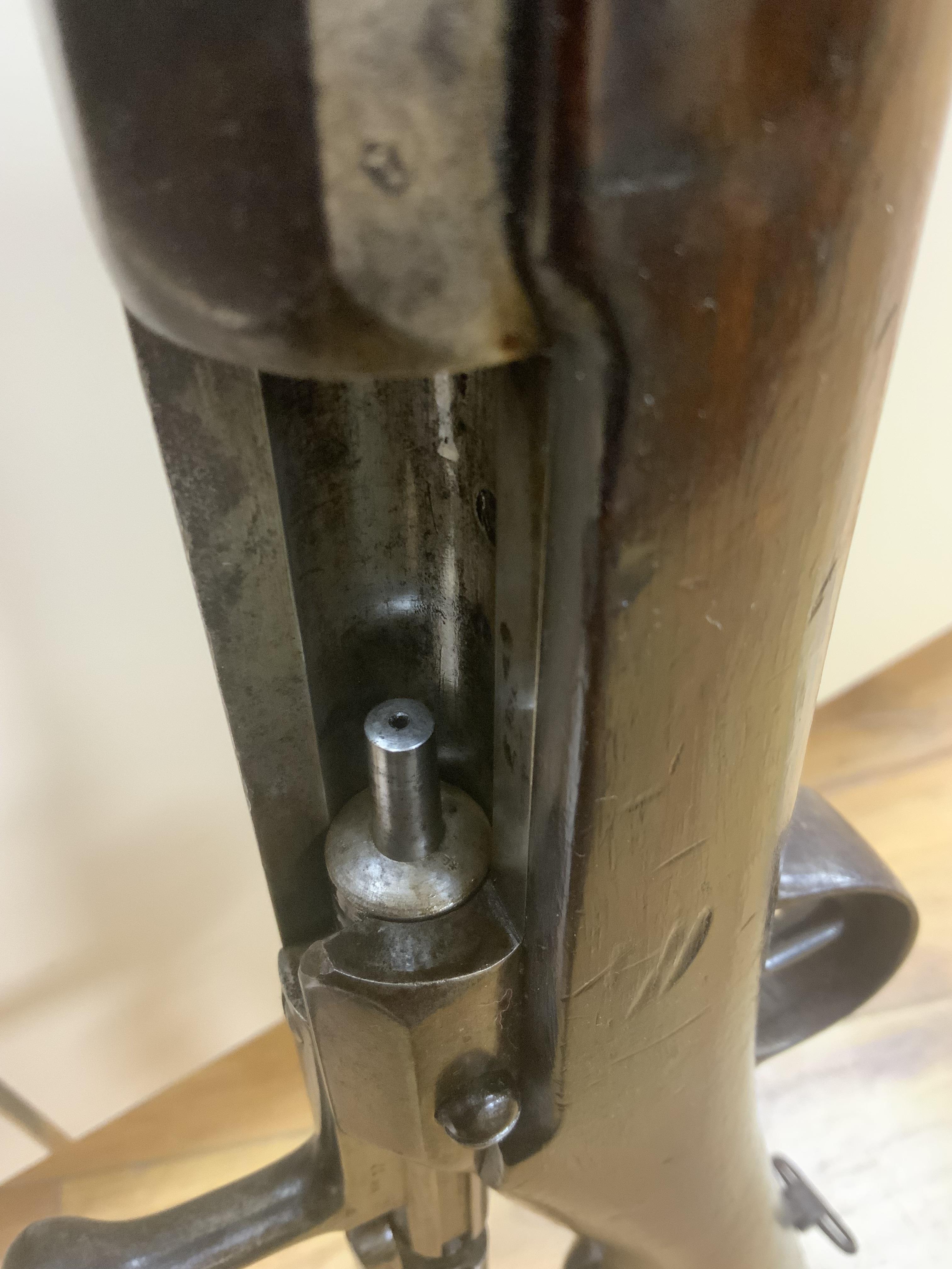 A French Chassepot bolt action rifle 1865-1874 with regulation, iron mounts, and 1868 brass handle bayonet dated 1868, barrel 79cm
